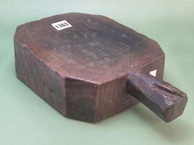 Lot 1363 - A hand carved wooden chopping board, the...