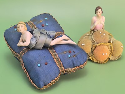 Lot 25 - Beside the sewing basket… A charming pair of...