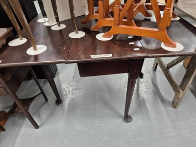 Lot 126 - A George III mahogany drop-leaf dining table...