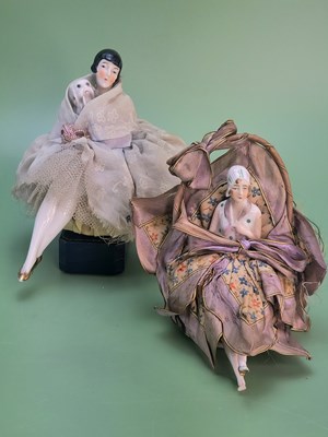 Lot 27 - A pair of Art Deco porcelain half-doll sewing...