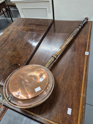 Lot 150 - A copper bed warming pan