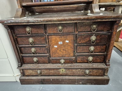 Lot 155 - An early 18th century burr walnut multi-drawer...
