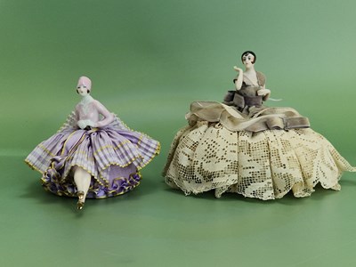 Lot 26 - A pair of Art Deco porcelain half-doll sewing...