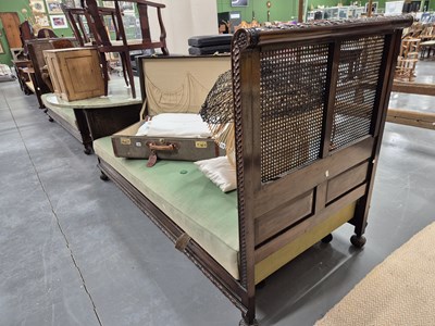 Lot 165 - A pair of early-20th-century caned single beds,...