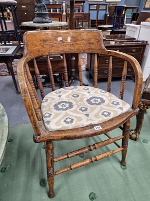 Lot 172 - An early 20th century bow back office armchair