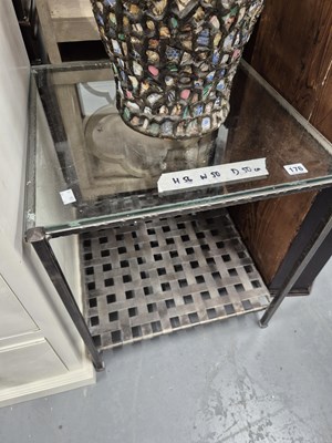 Lot 176 - A glass and wrought iron occasional table
