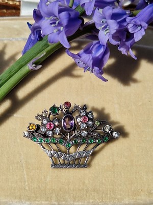 Lot 4 - A basket of blooms…A silver gem-set flower...