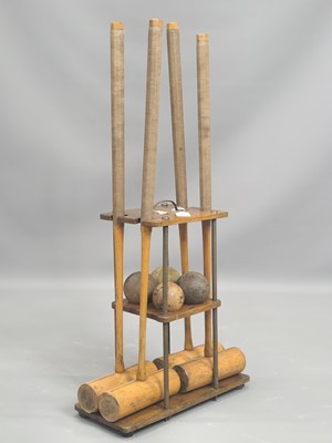 Lot 1383 - A Jaques three tier rack of croquet mallets...