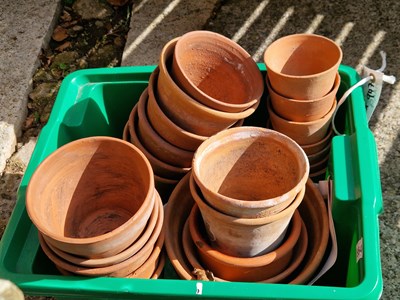 Lot 947 - A variety of terracotta plant pots ranging in...