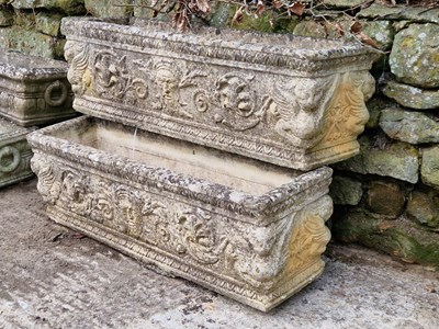 Lot 954 - Two large stone troughs with decorations cast...