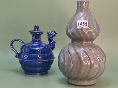 Lot 1439 - A Chinese spirally fluted double gourd vase...