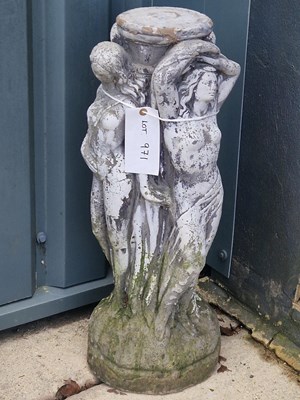 Lot 971 - A bird bath stand depicting four female...