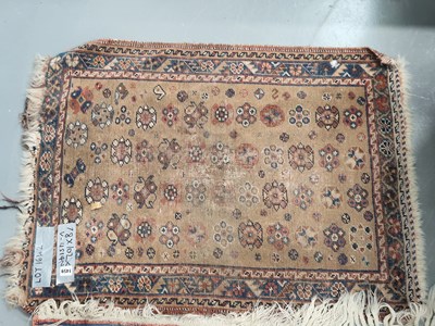 Lot 1459 - An Antique Persian tribal mat together with a...