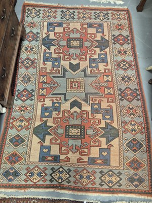 Lot 1465 - A Turkish rug of Caucasian design