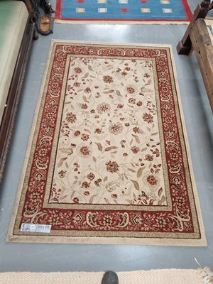 Lot 1471 - A machine made rug of Persian design 197 × 137cm