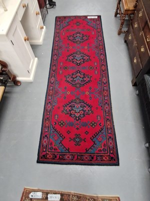 Lot 1474 - A machine made runner of Turkish Oushak design...