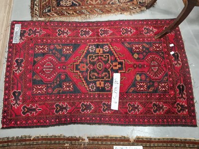 Lot 1483 - An oriental tribal rug 134 × 84cm