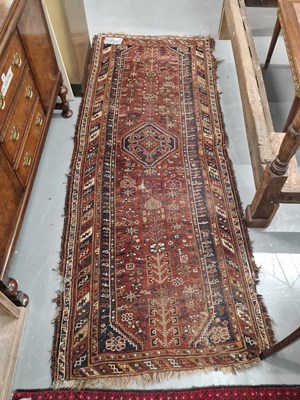 Lot 1484 - An antique Persian Shiraz rug 265 × 100cm