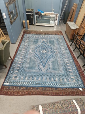 Lot 1490 - A machine made carpet of Scandinavian design...