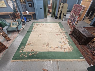 Lot 1501 - An oriental rug of Chinese Art Deco design 416...