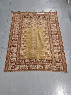 Lot 1505 - An antique Turkish Ghiordes prayer rug