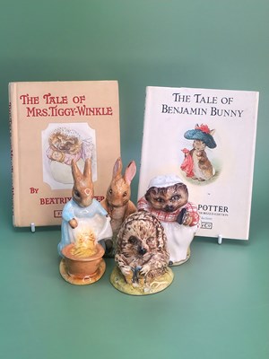 Lot 23 - A Group of Beatrix Potter Figures and Books. A...