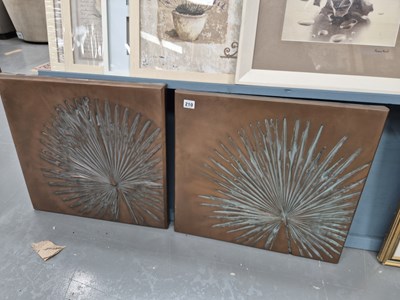 Lot 210 - A pair of copper toned decorative wall panels,...