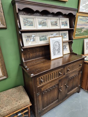 Lot 214 - A vintage oak dresser and rack.  W 122 D 46 H...