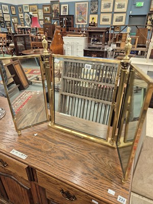 Lot 232 - A brass framed triple plate folding dressing...