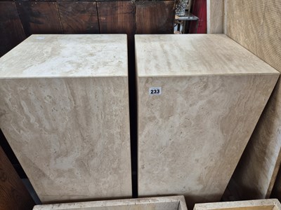 Lot 233 - A pair of travetine marble pedestals. H 91 W...