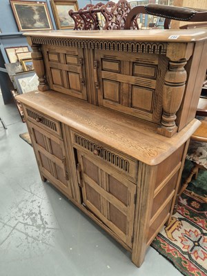 Lot 240 - A vintage Ercol oak court cupboard H 126 w 123...