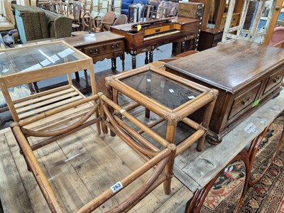 Lot 263 - An oak cabinet, bamboo stands, an occasional...