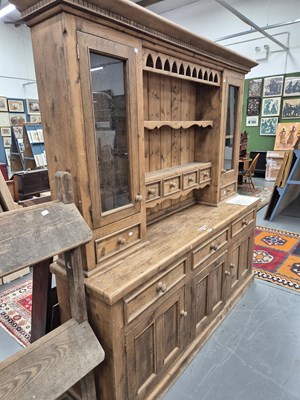 Lot 277 - A large Victorian style pine dresser with...