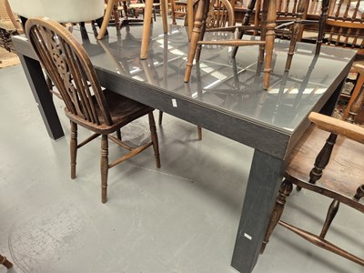 Lot 333 - A Ligne Roset glass topped extending dining...
