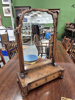 Lot 334 - A Georgian style walnut dressing table mirror...