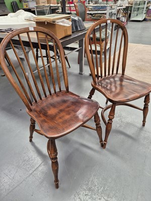 Lot 354 - A set of four Windsor stick-back chairs with...