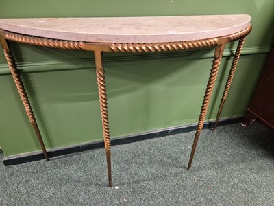 Lot 366 - Allan Williams.- A wrought iron marble-topped...