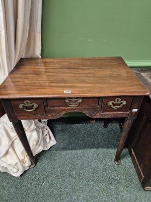 Lot 370 - A George III mahogany three drawer low boy...