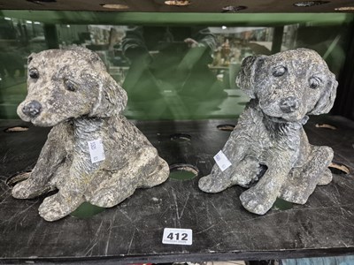 Lot 412 - A pair of small garden figures of dogs