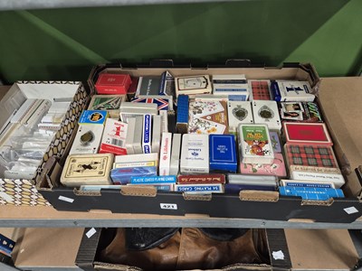 Lot 421 - An extensive collection of playing cards,...