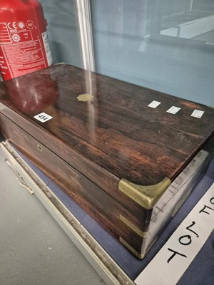 Lot 454 - A Victorian rosewood workbox with vacant interior