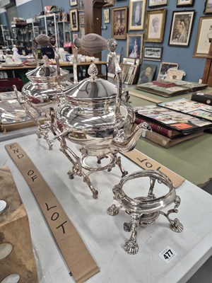 Lot 477 - Two silver-plated kettles on stands and a...