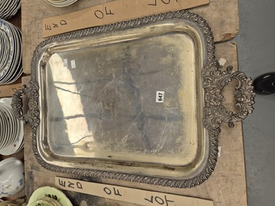Lot 647 - A large silver-plated serving tray.