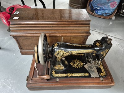 Lot 660 - A Singer sewing machine