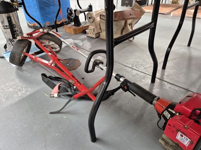 Lot 661 - A petrol strimmer, a golf trolley and a garden...