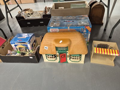 Lot 669 - A selection of Sylvanian family figures and...