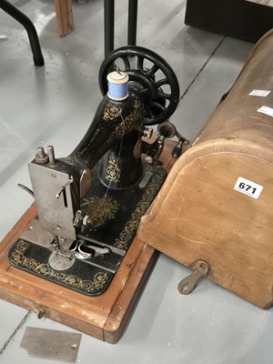 Lot 671 - A Singer sewing machine