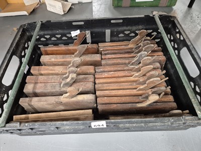 Lot 694 - A set of antique wood moulding planes