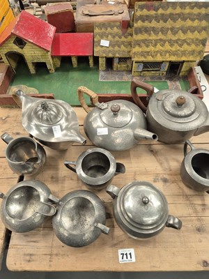 Lot 711 - Vintage pewter teawares and a toy farm