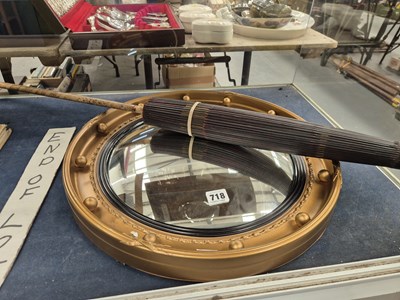 Lot 718 - A vintage convex wall mirror and a parasol
